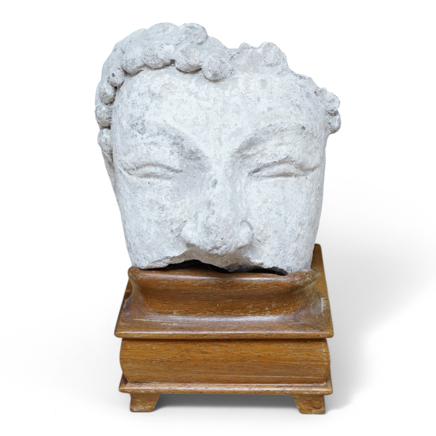 A stucco work Buddha head, possibly Tang Dynasty, 15.5cm high. Condition - fair